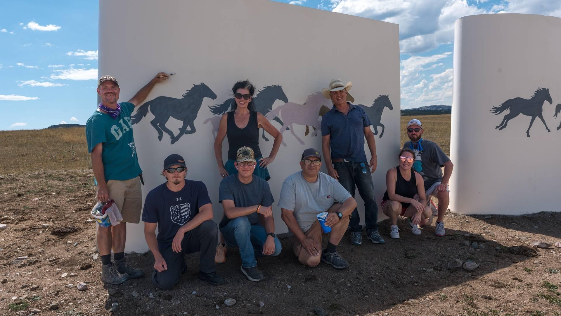Crew at Wall of Renewal