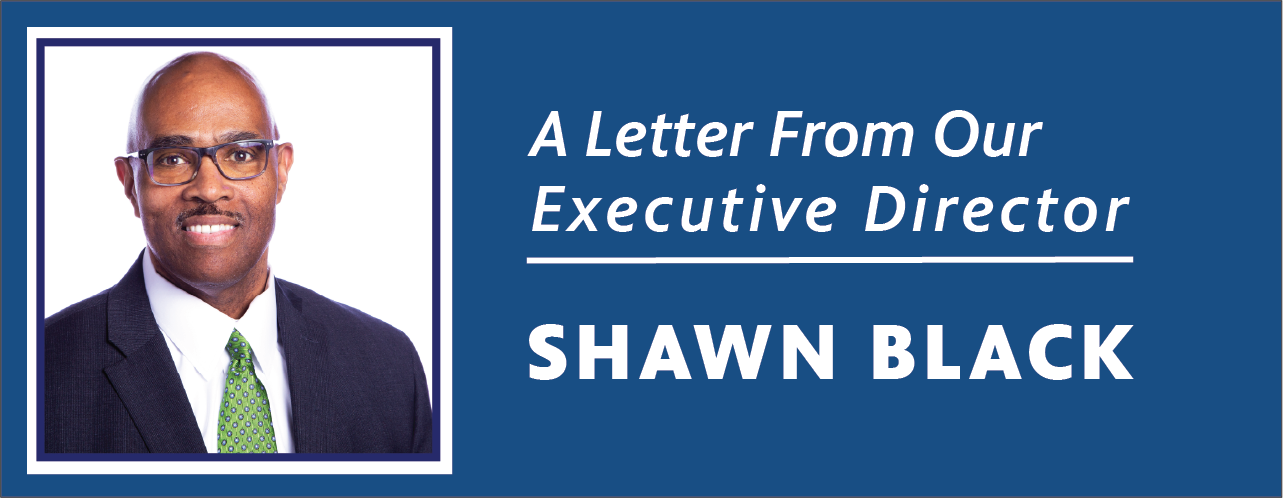 “Portrait of Shawn Black, Executive Director of OETA, alongside the text ‘A Letter From Our Executive Director — Shawn Black.’