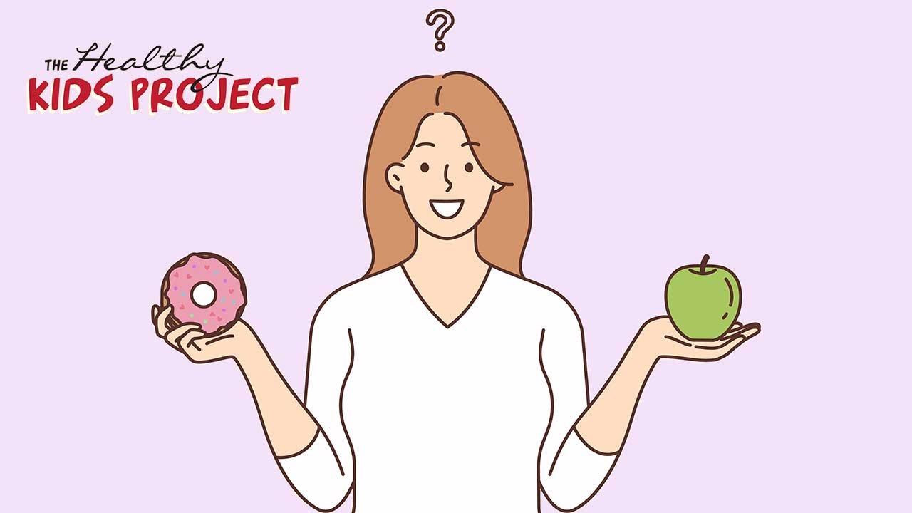 A smiling cartoon woman holds an apple in her left hand and a doughnut in her right hand. A question mark appears over her head.