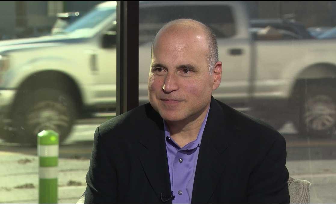 Texas Talk host Gilbert Garcia smiles