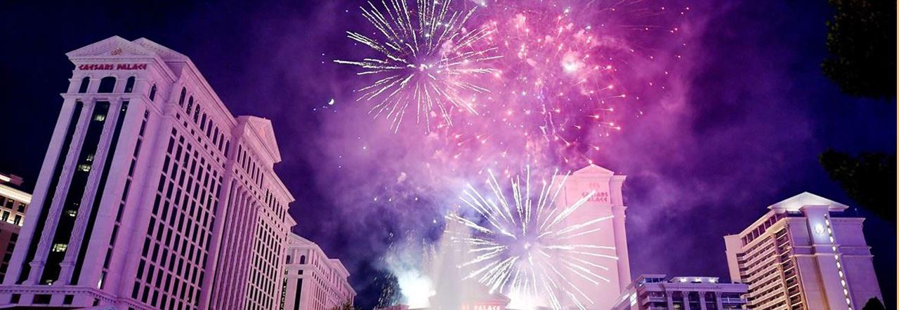 Fireworks erupt over Caesar's Palace at night