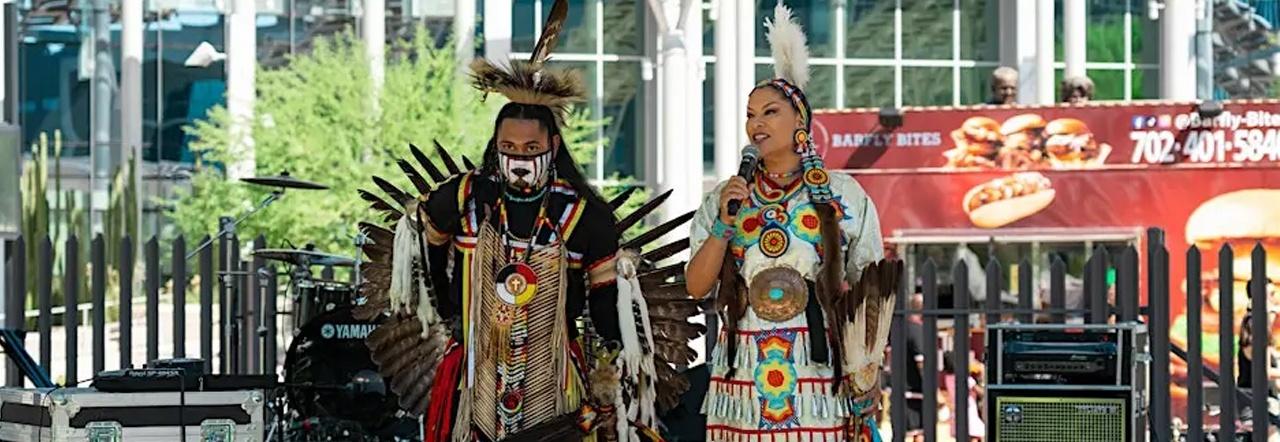 Indigenous Talent Show performers on stage in traditional dress