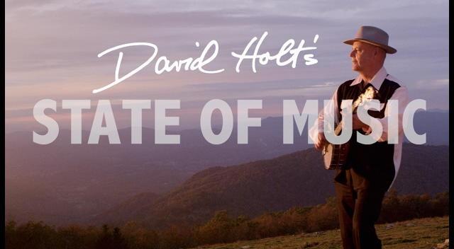 title atop picture of David Holt on a mountain