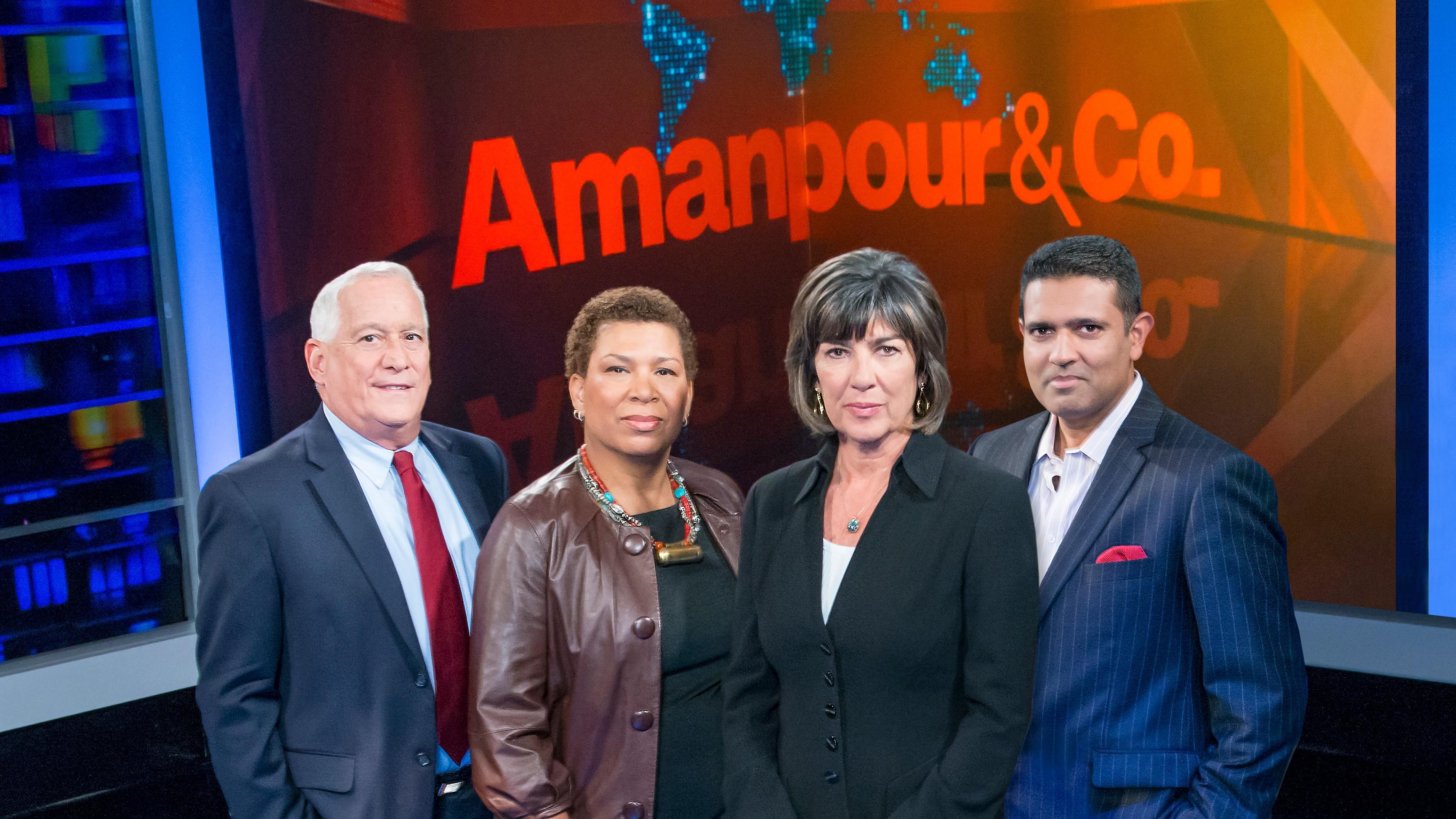 four hosts stand in front of a screen displaying the title Amanpour & Co.