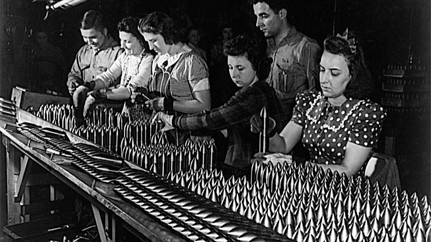 Women at munitions factory, working on the assembly line.