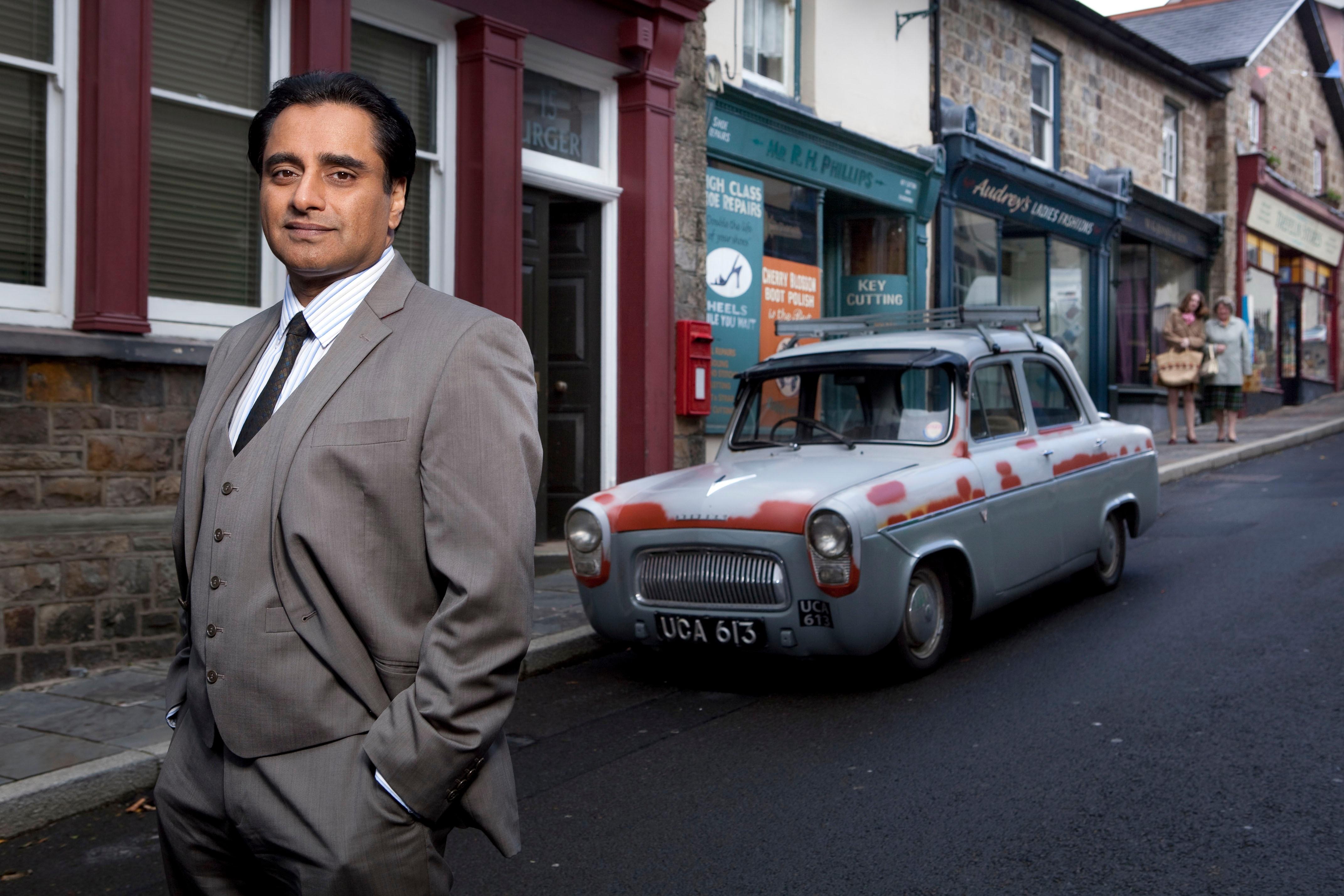 Delhi graduate Dr. Prem Sharma played by Sanjeev Bhaskar