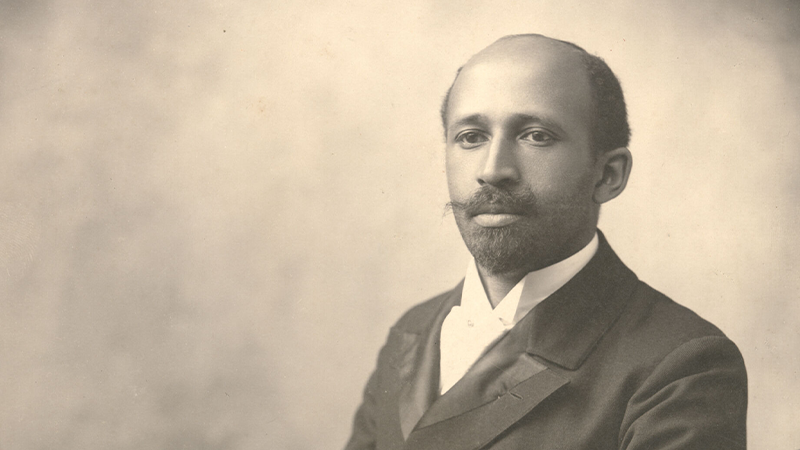  A black and white photo of W.E.B. Du Bois in formal attire.