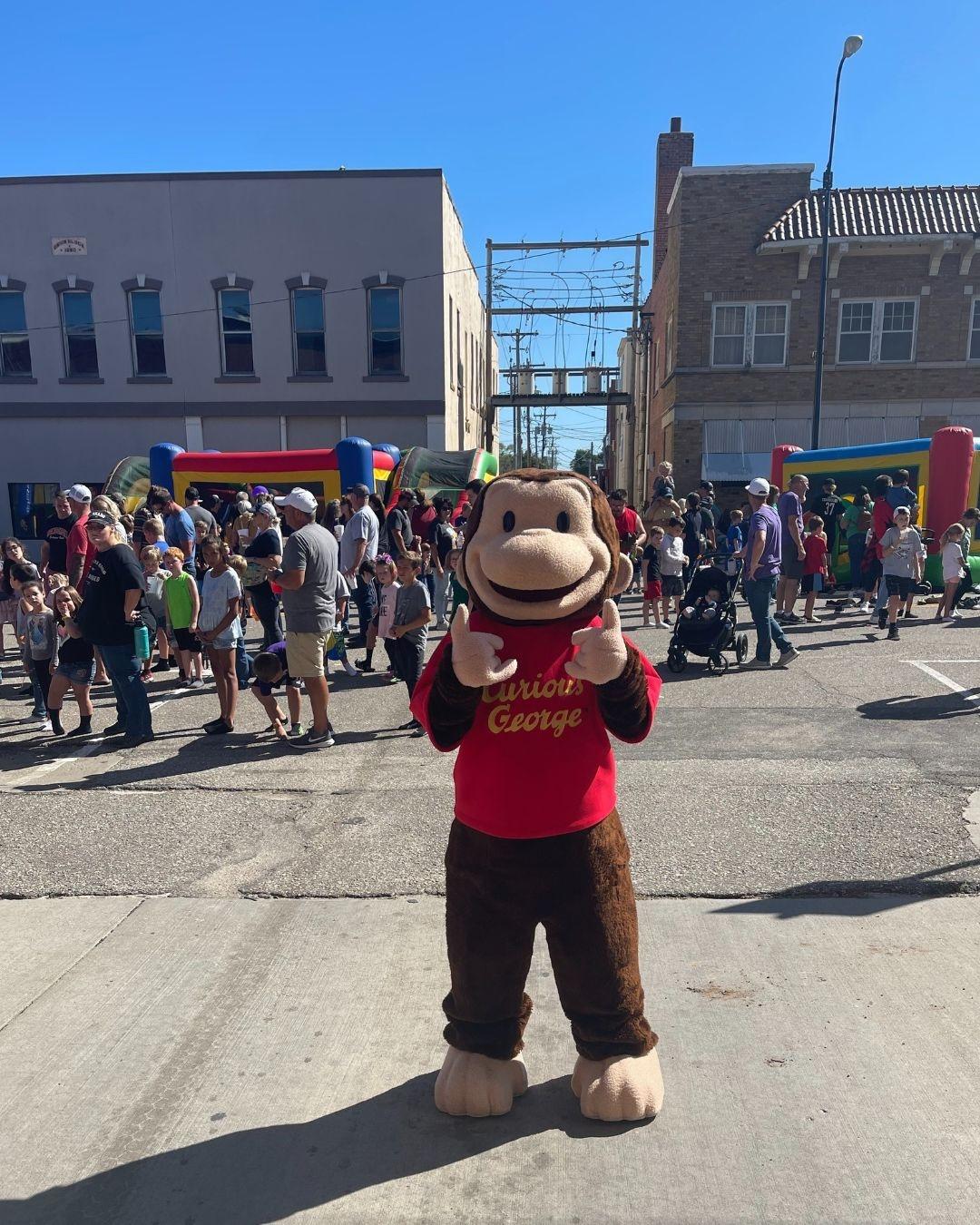 Curious George on street