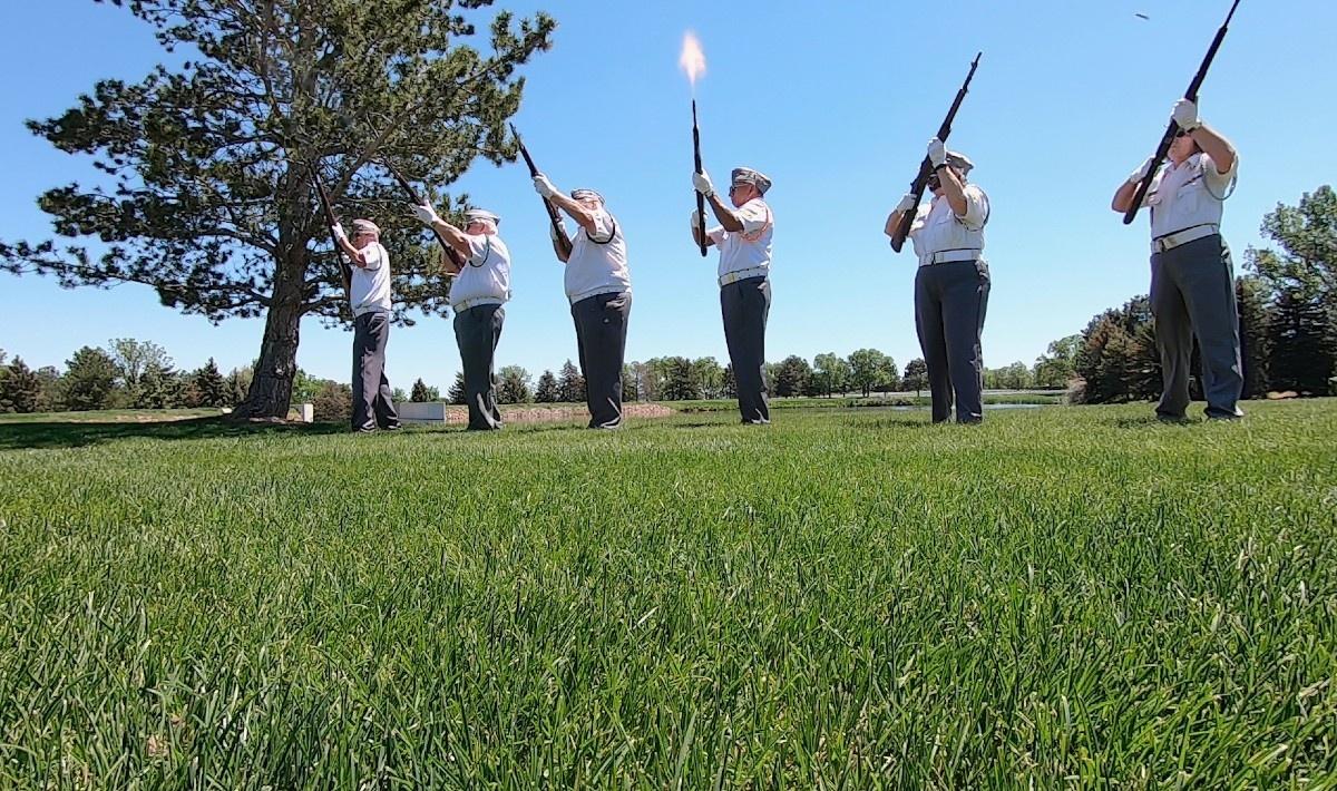 Memorial Day at Denver's Fort Logan National Cemetery. Veterans share what Memorial Day mean to them, and perform a rifle volley for a fallen service member.