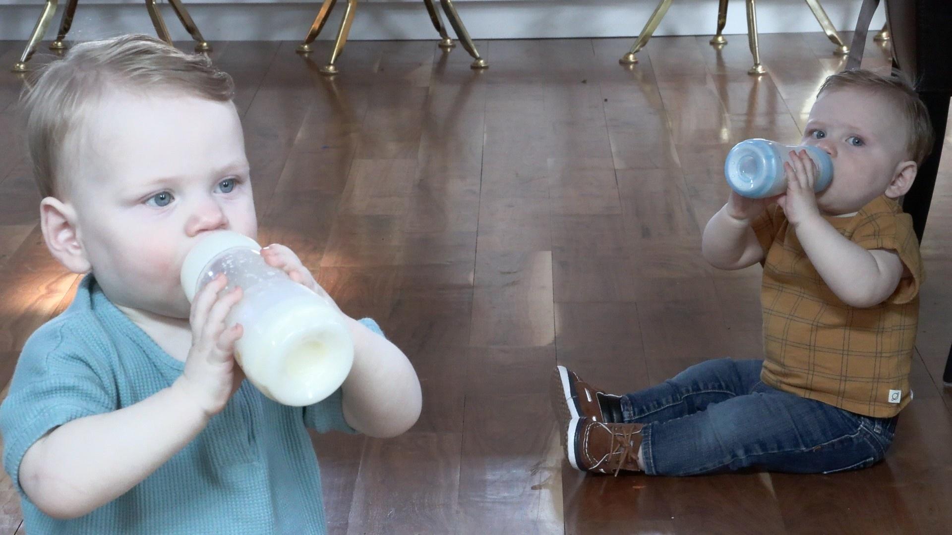 Twins Landon and Connor, pictured here drinking their bottles, are both doing well after surviving a rare condition called twin-to-twin transfusion syndrome when they were in the womb.