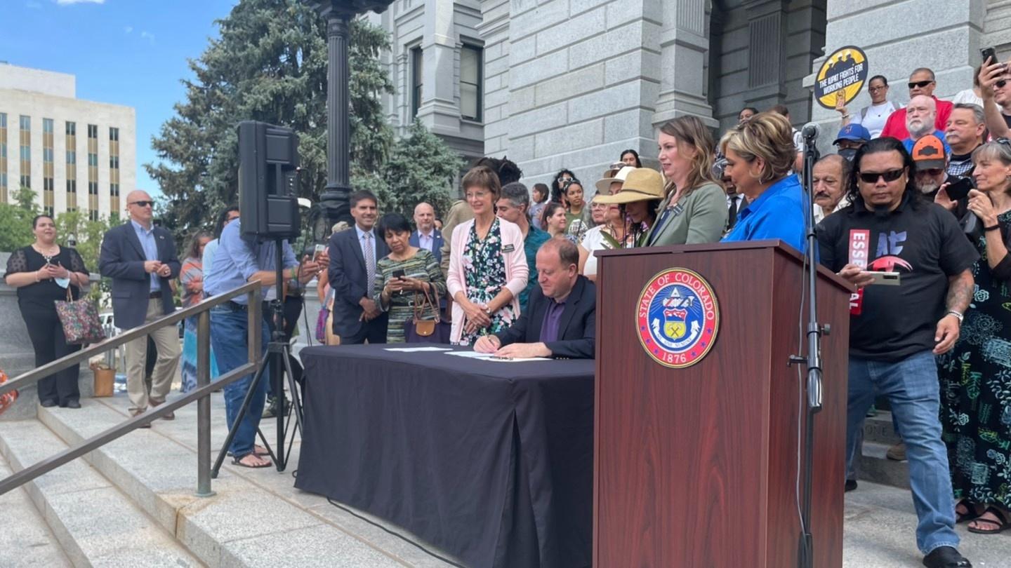 Governor Polis signs the 'Farmworkers Bill of Rights' into law Friday, June 25