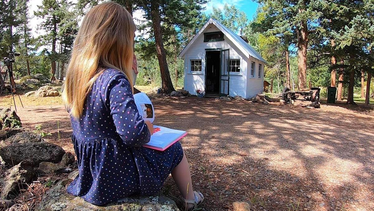 A big, Little Free Library in Evergreen has become an integral part of the community and will be staying open despite the property changing owners.