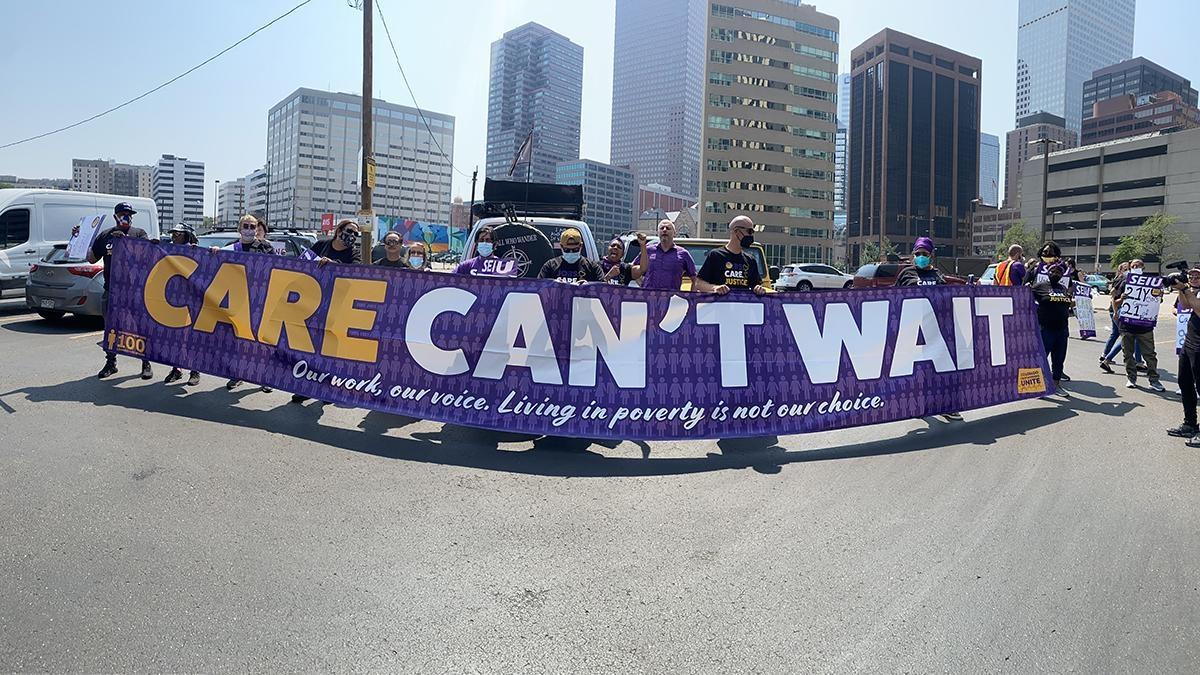 After months of waiting, dozens of protesters marched to the Colorado Department of Labor and Employment demanding better wages and affordable health care.