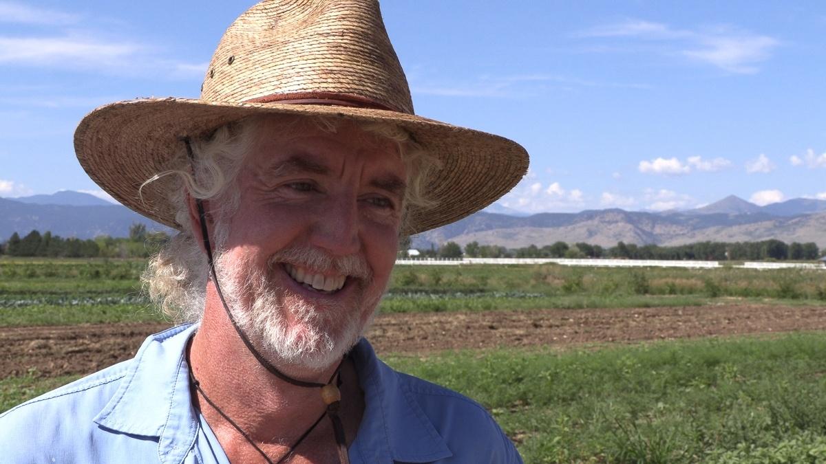 Michael Moss of Kilt Farm stands in his field of crops