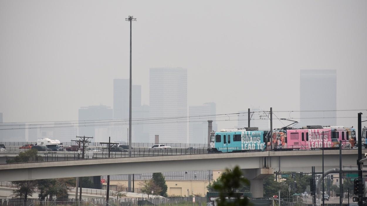 Ozone and wildfire smoke combined to make Denver home to some of the worst air quality in the world this summer. This photo from August 7, 2021, shows the haze in Denver.