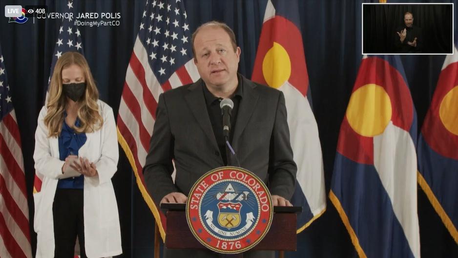 Governor Jared Polis discusses the first confirmed case of the Omicron variant of COVID-19 on December 2, 2021.
