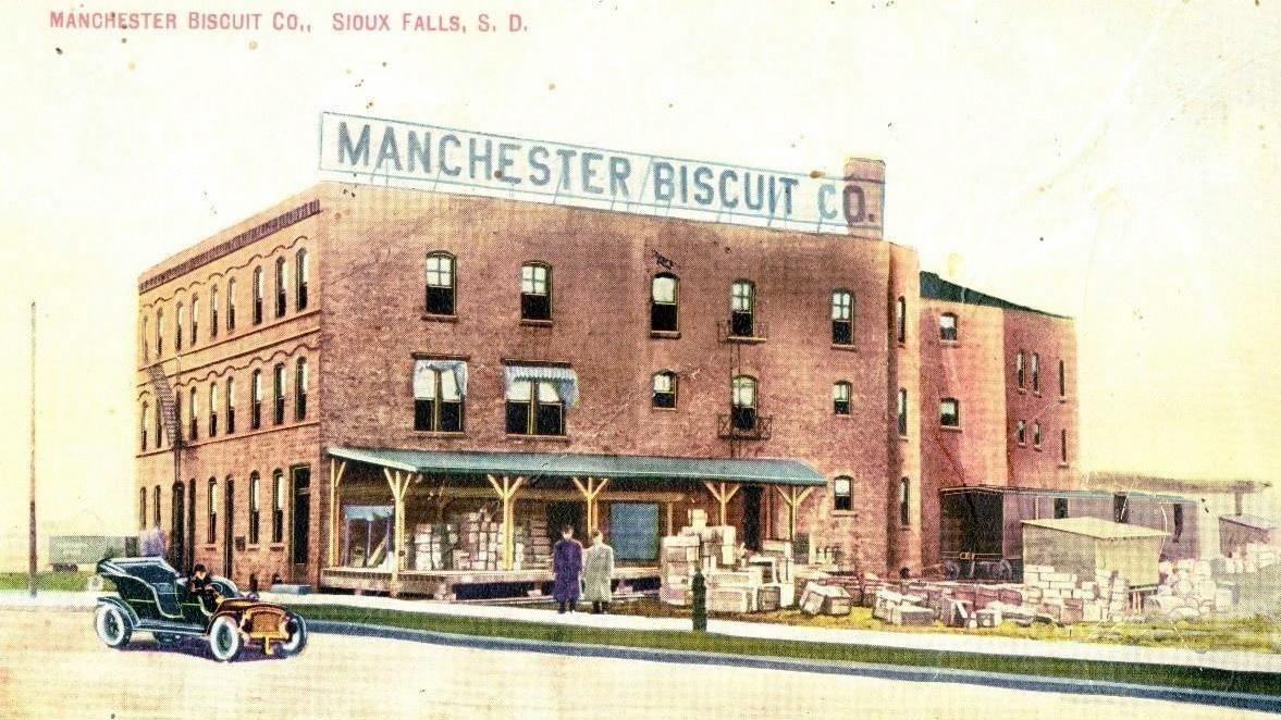Archival painting of the Manchester Biscuit Co building. 