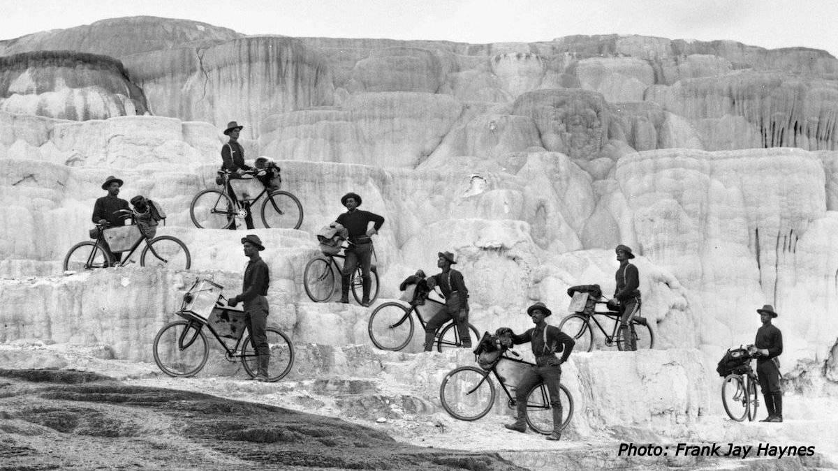 Archival photo of soldiers with their bicycles in the Badlands, SD. 