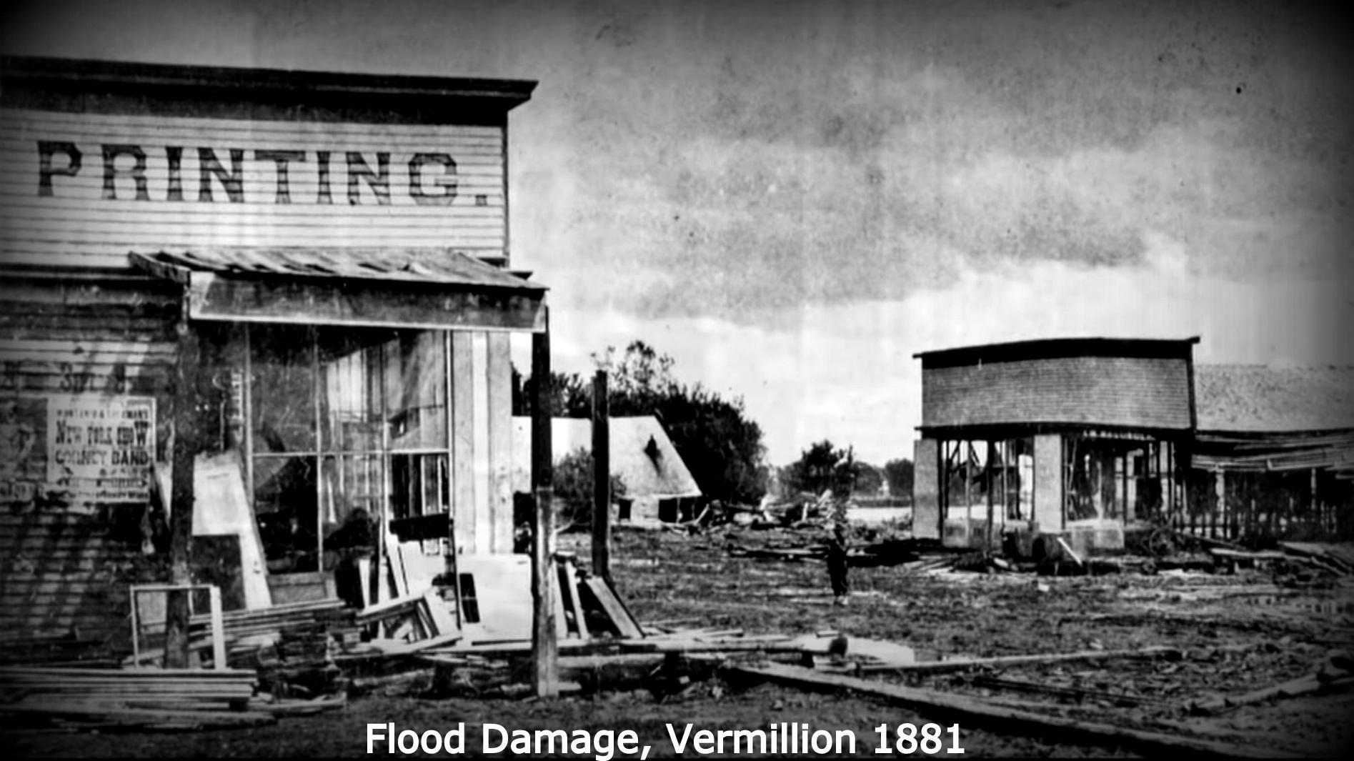 Damaged buildings after the 1881 flood in Vermillion, South Dakota. 