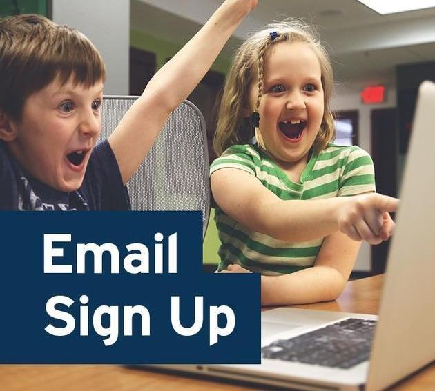 Email Sign Up graphic - two children are in front of a computer and they are very excited and happy. 
