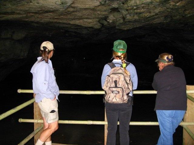 Travelers looking inside the Big Ice Cave
