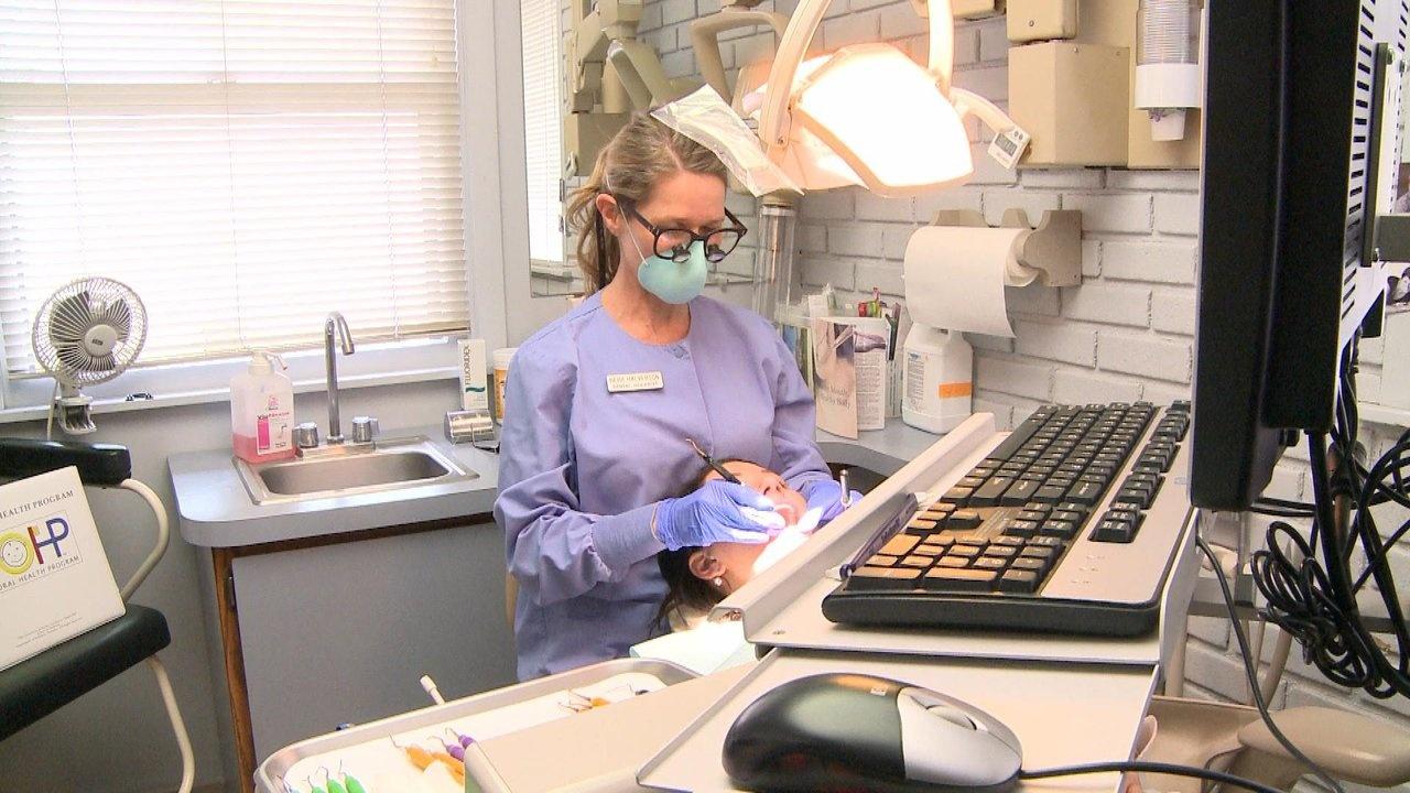Dental hygienist Heidi Halverson working with American Eagle Instruments