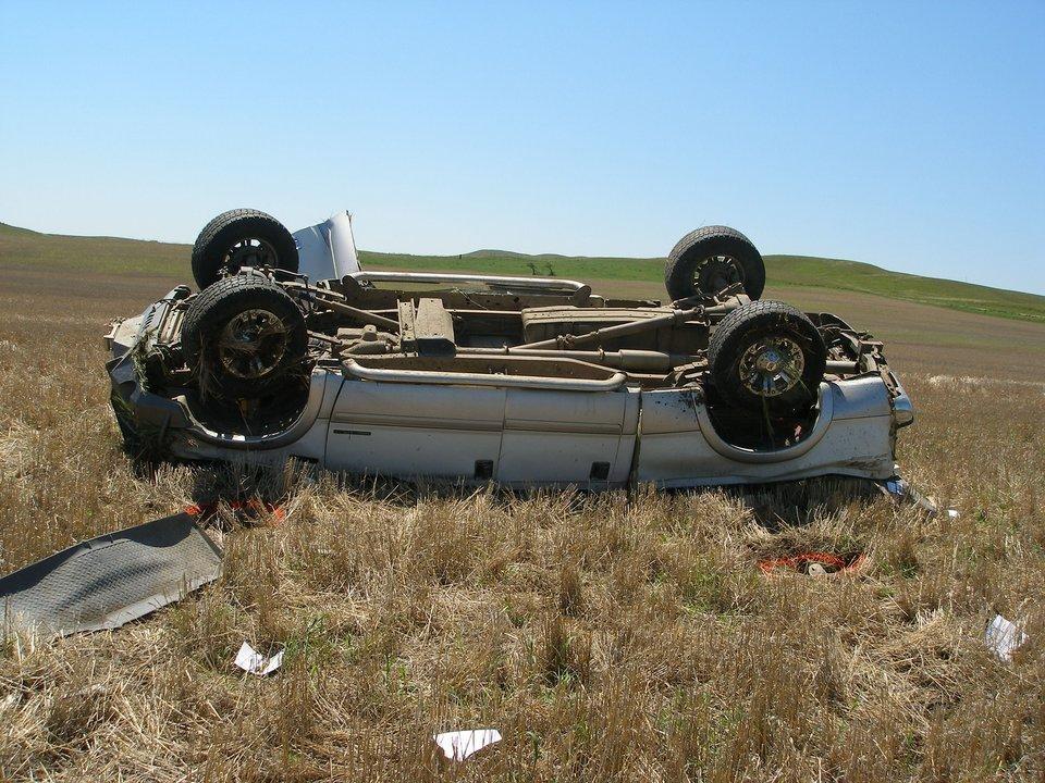 Distracted driving aftermath accident Sidney rollover