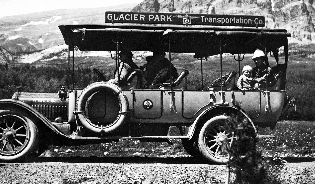 Early touring bus - 1914 Glacier Park Archives