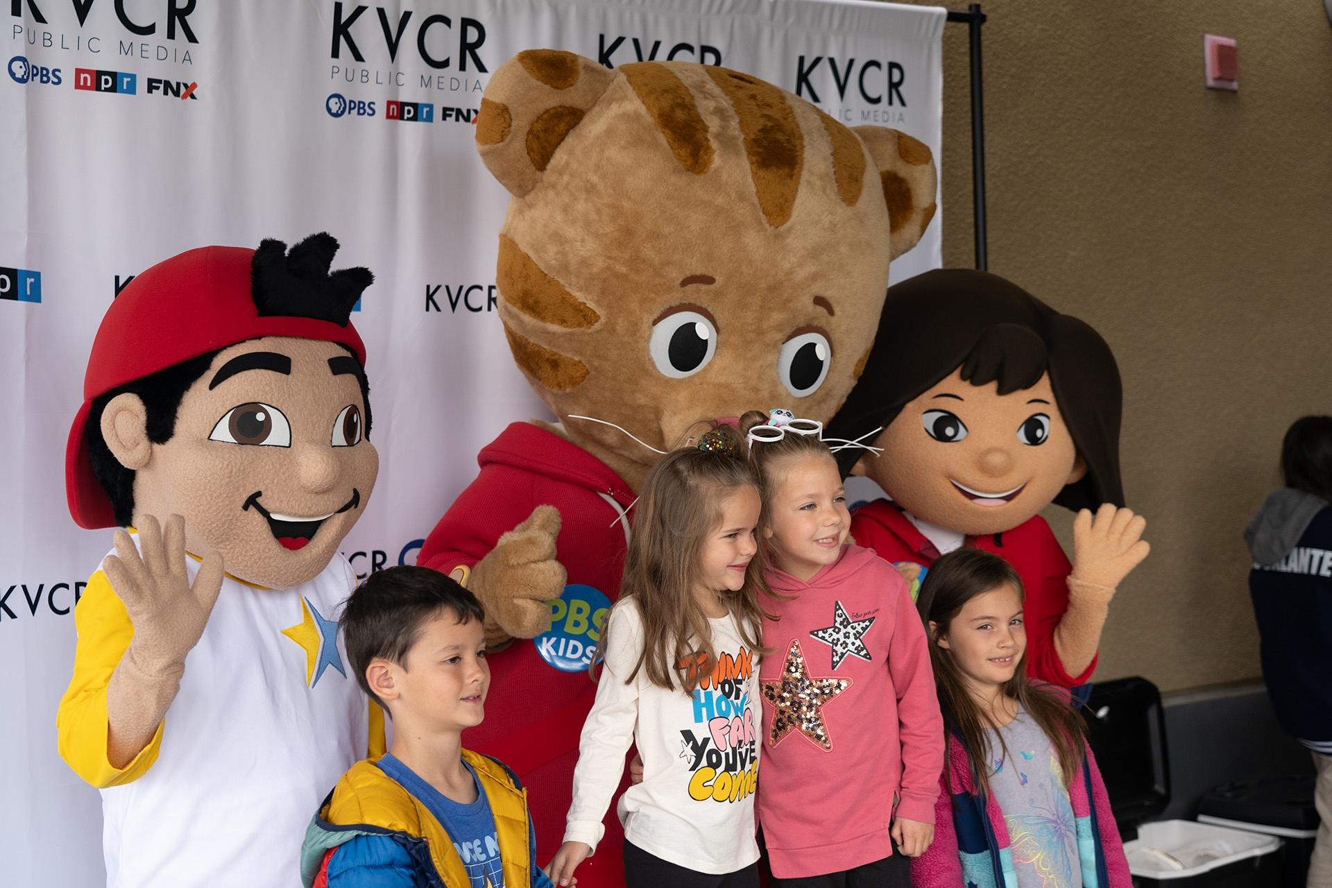 Kids Smiling with PBS Kids Characters and Eddie from Learn With Me