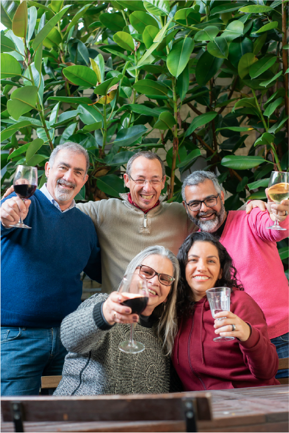 A group of people enjoying wine