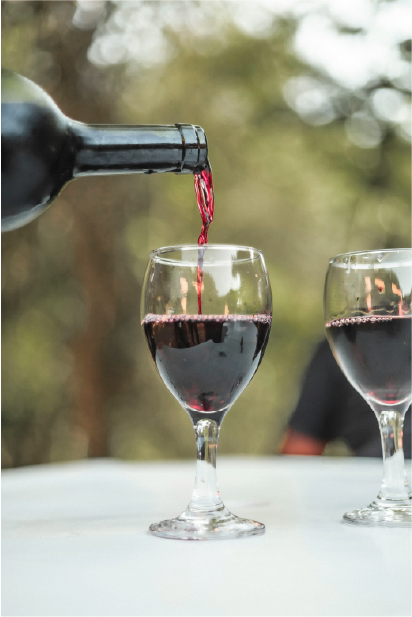 Wine being poured into a glass