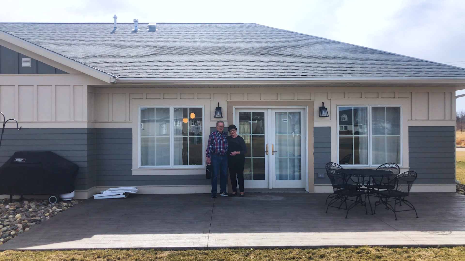 Doc and Sharon Skordahl stand in front of their new home in Riverview Estates