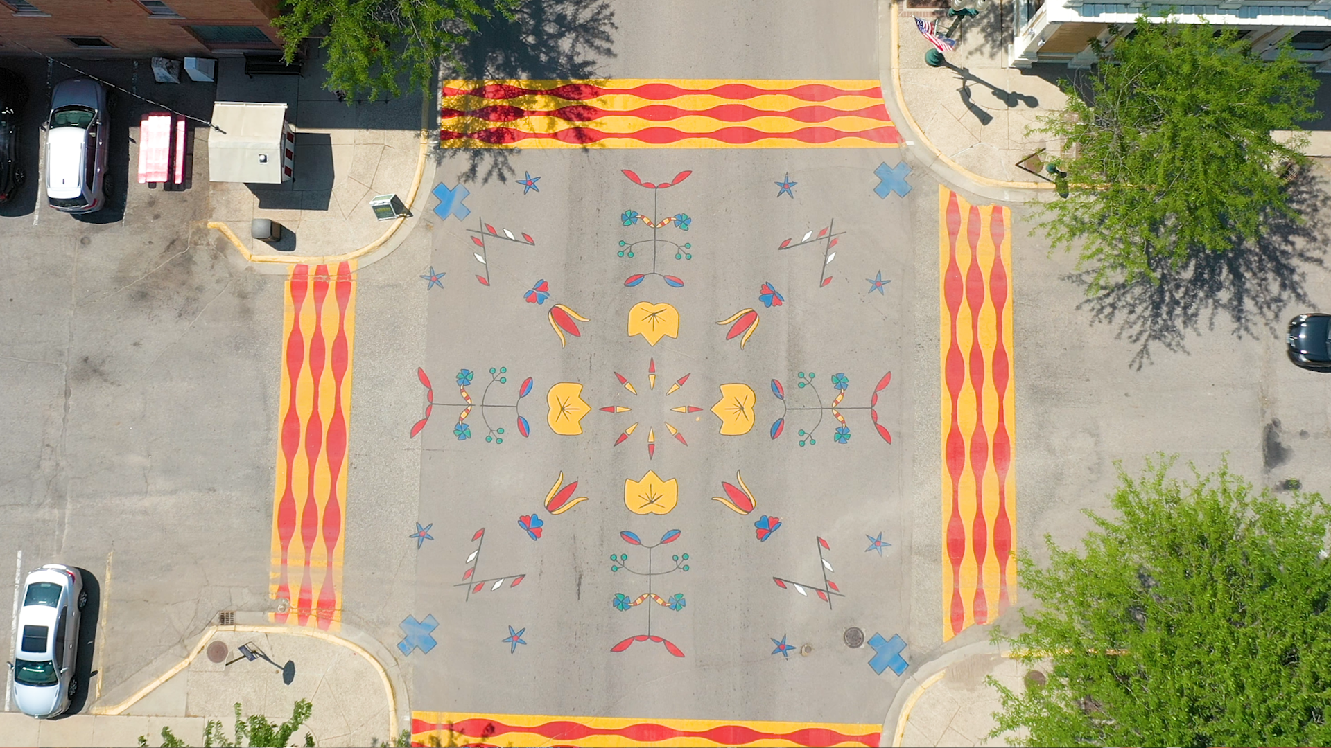 An aerial photo of an intersection in downtown Granite Falls painted in Dakota themes.