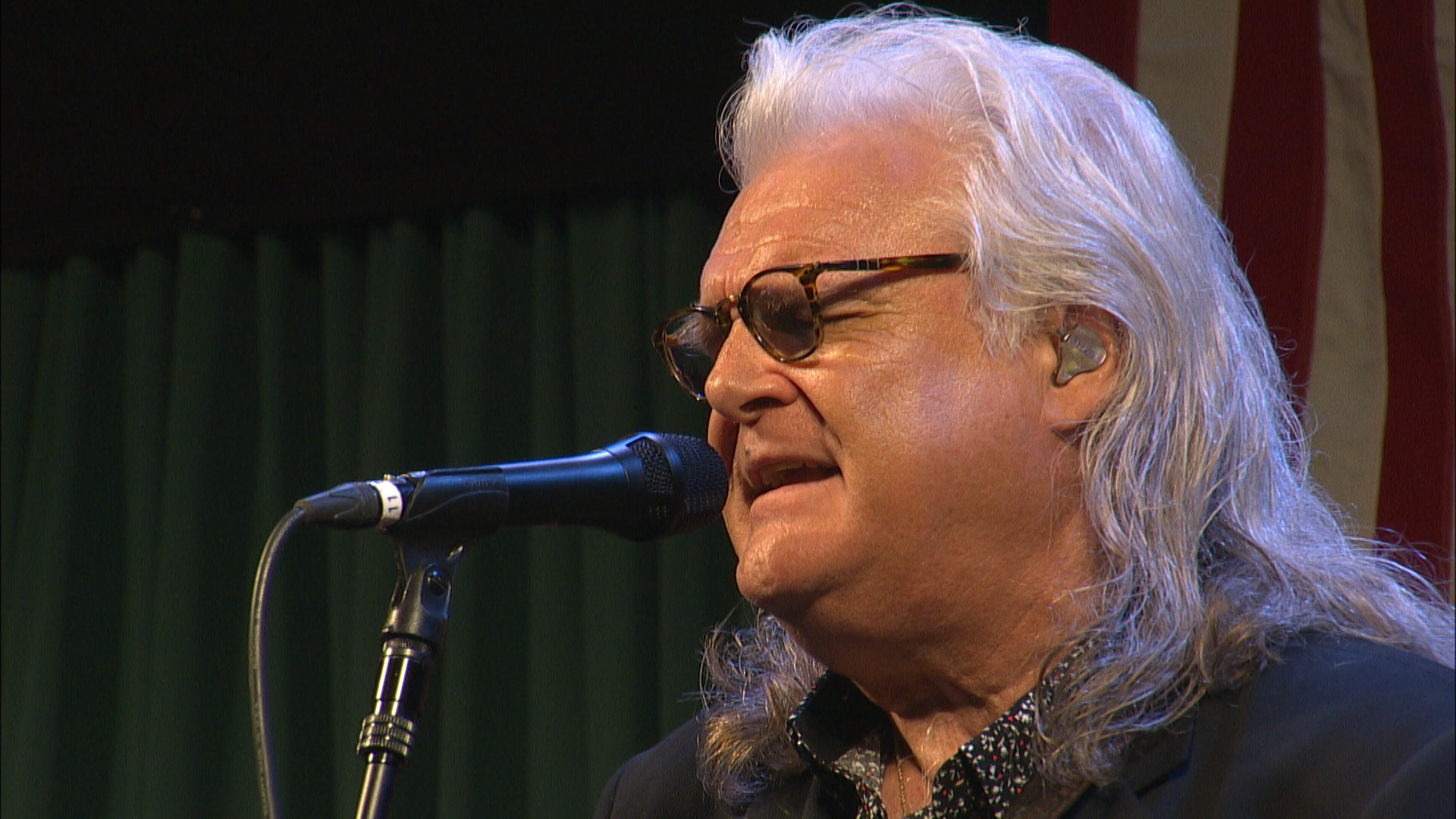 Ricky Skaggs performing on the main stage.