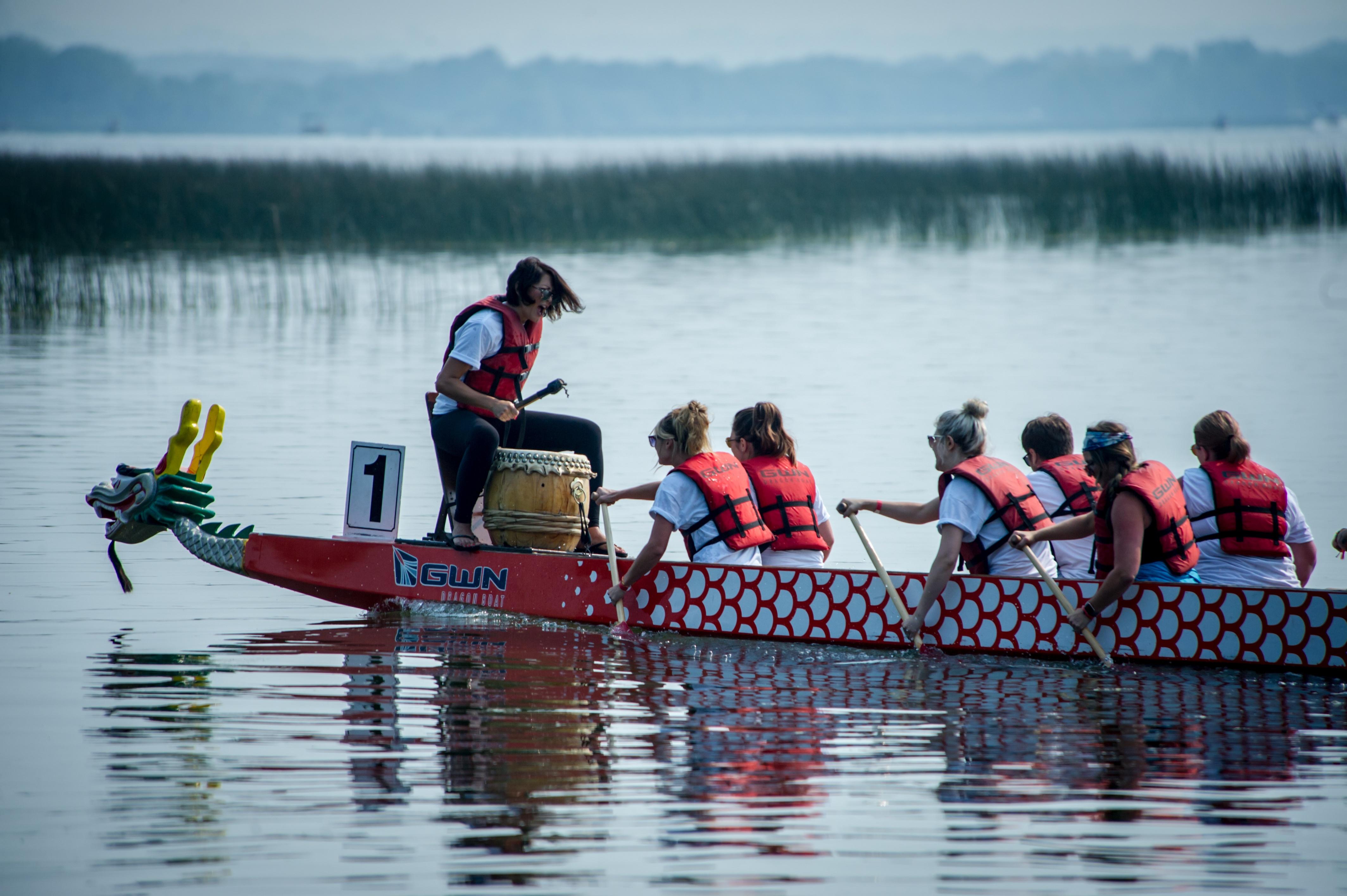 Sharma Dahl leading a team of dragon boat racers.