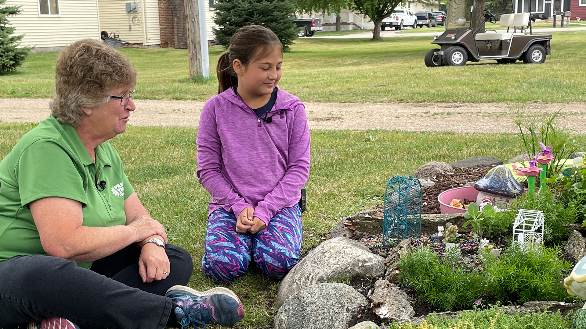 Mary Holm interviews one of the many children of Herman who maintain Fairy gardens there