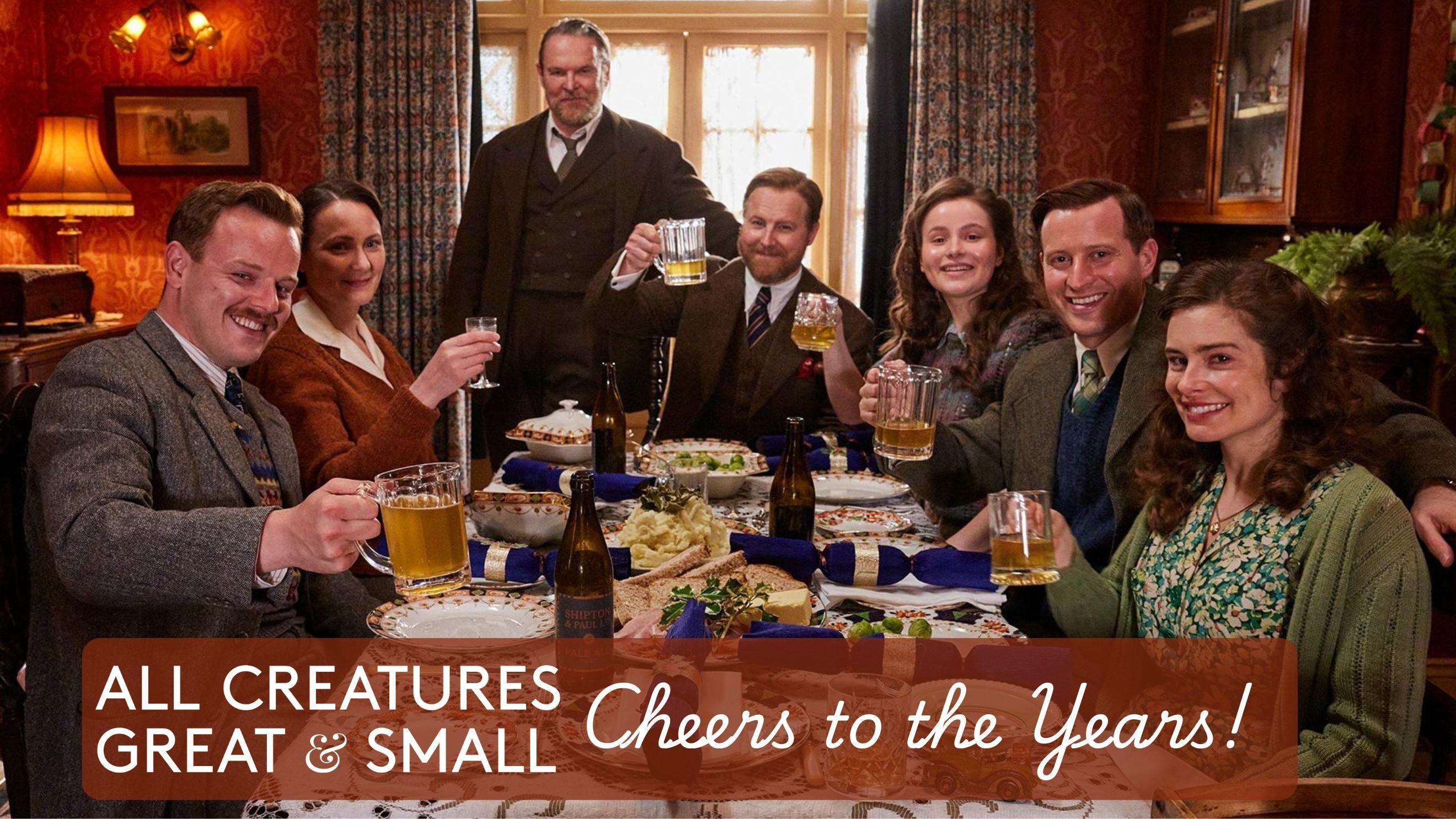 The cast of All Creatures Great and Small sit around a dining table for an elaborate meal. They each hold a mug of beer in their hands that are lifted in salute. The title of the program is All Creatures Great and Small Cheers to the Years.