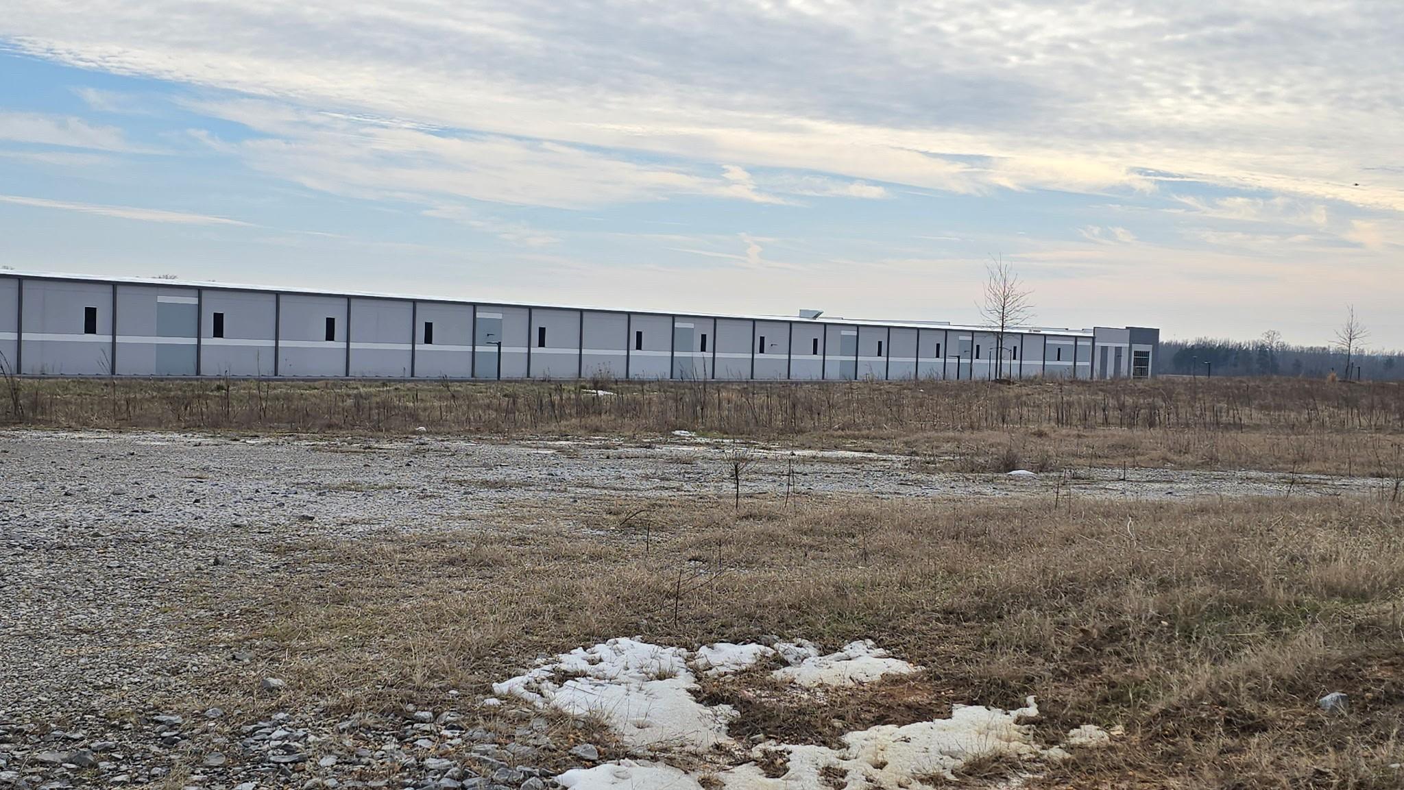 A warehouse that may be purchased by ICE facility is seen in Byhalia with a patch of snow on the ground.