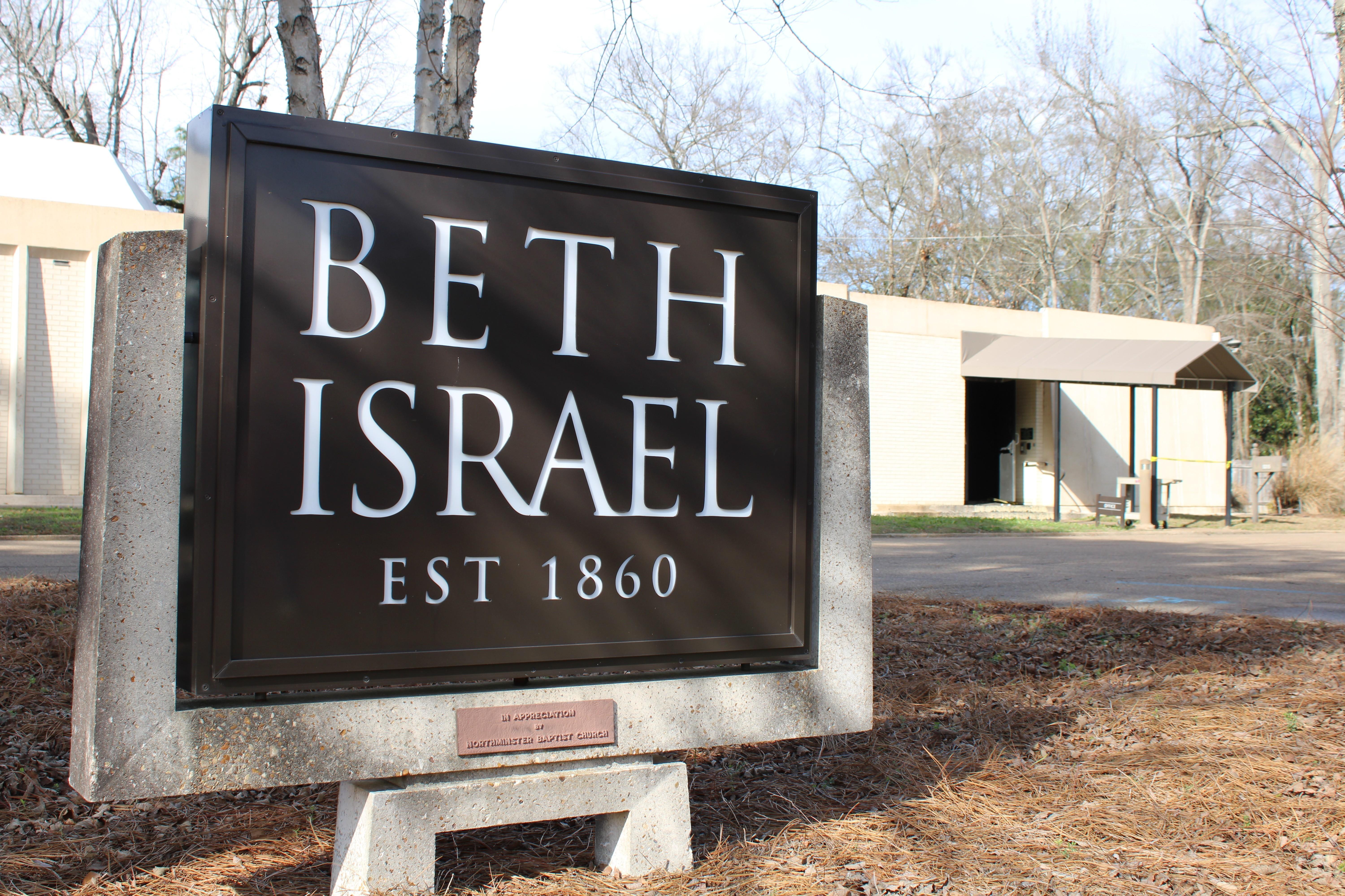 The sign at Beth Israel Congregation in Jackson, with police tape seen in front of a side entrance January 12, 2026.