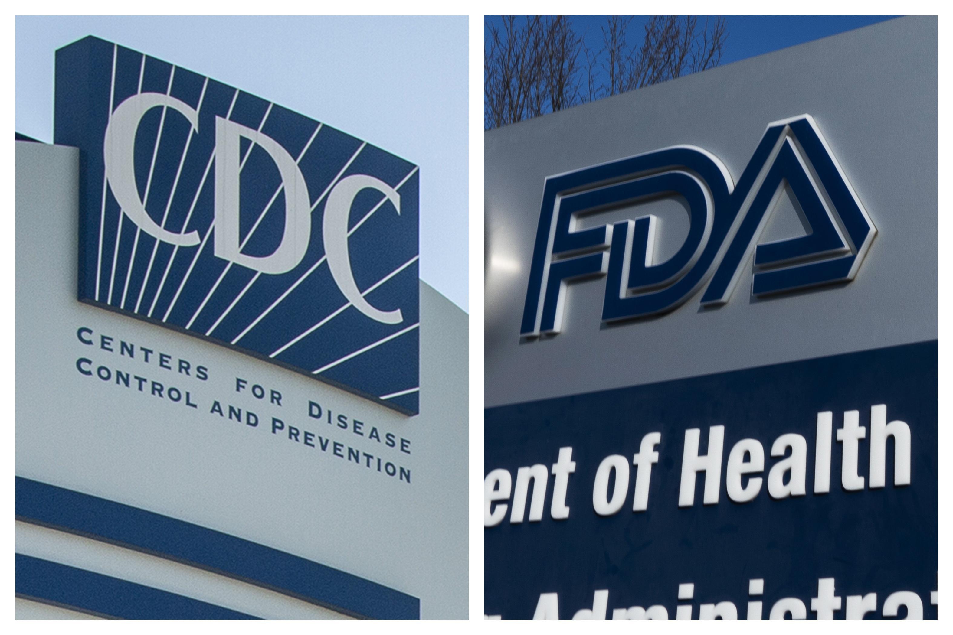 This combination of 2022 and 2020 file photos shows logos for the U.S. Centers for Disease Control and Prevention and the Food and Drug Administration. 