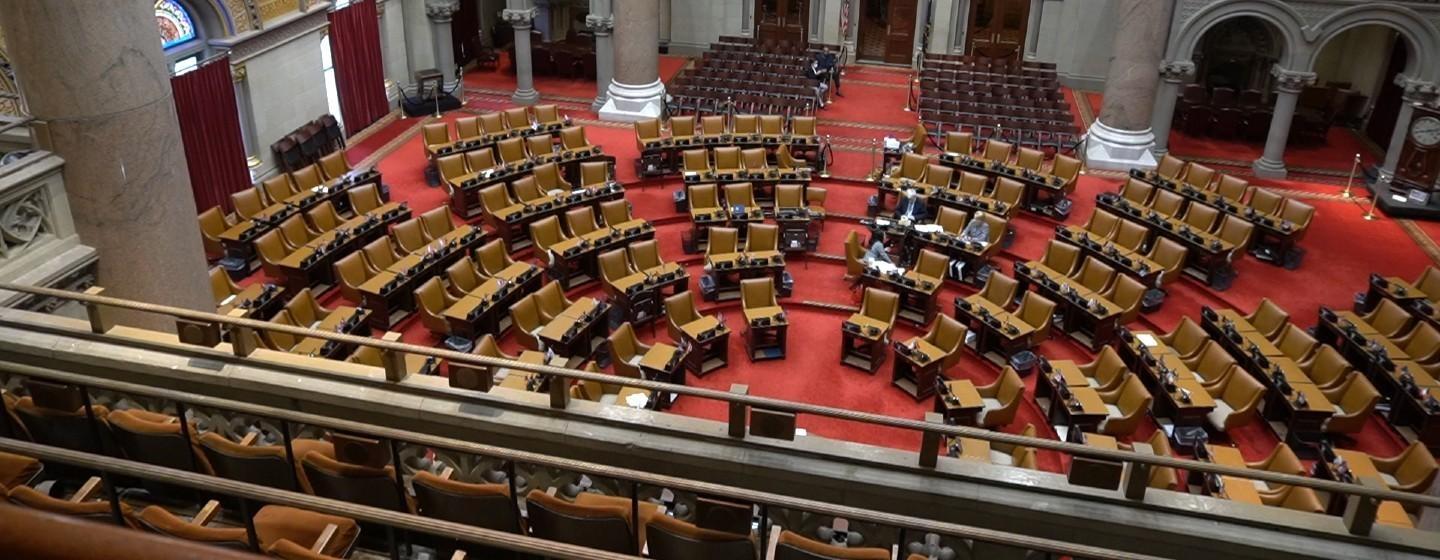 Empty seats at the New York State Assembly