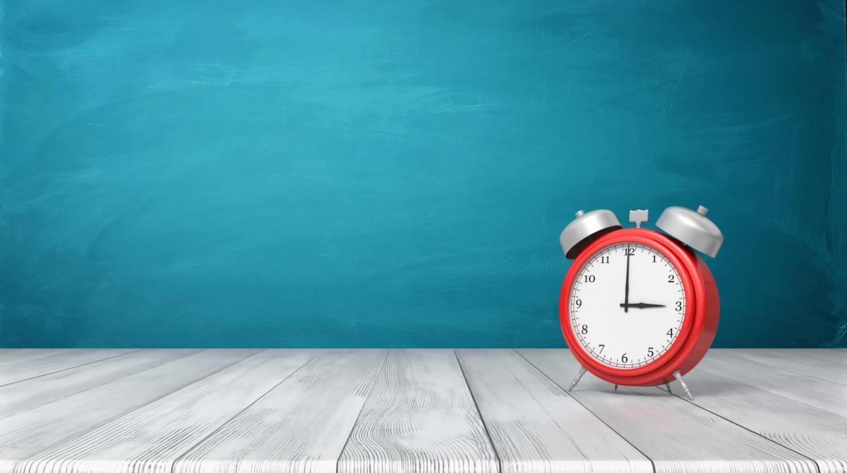 Image of a red analog clock