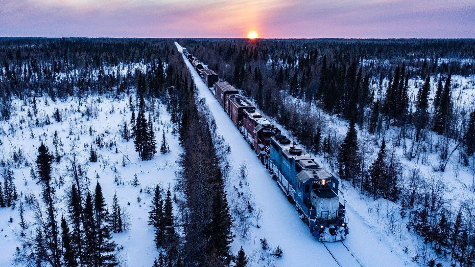 The Winnipeg-Churchill train crosses the difficult landscape of Manitoba from south to north, traversing snow-covered grasslands and Canada's boreal forest.