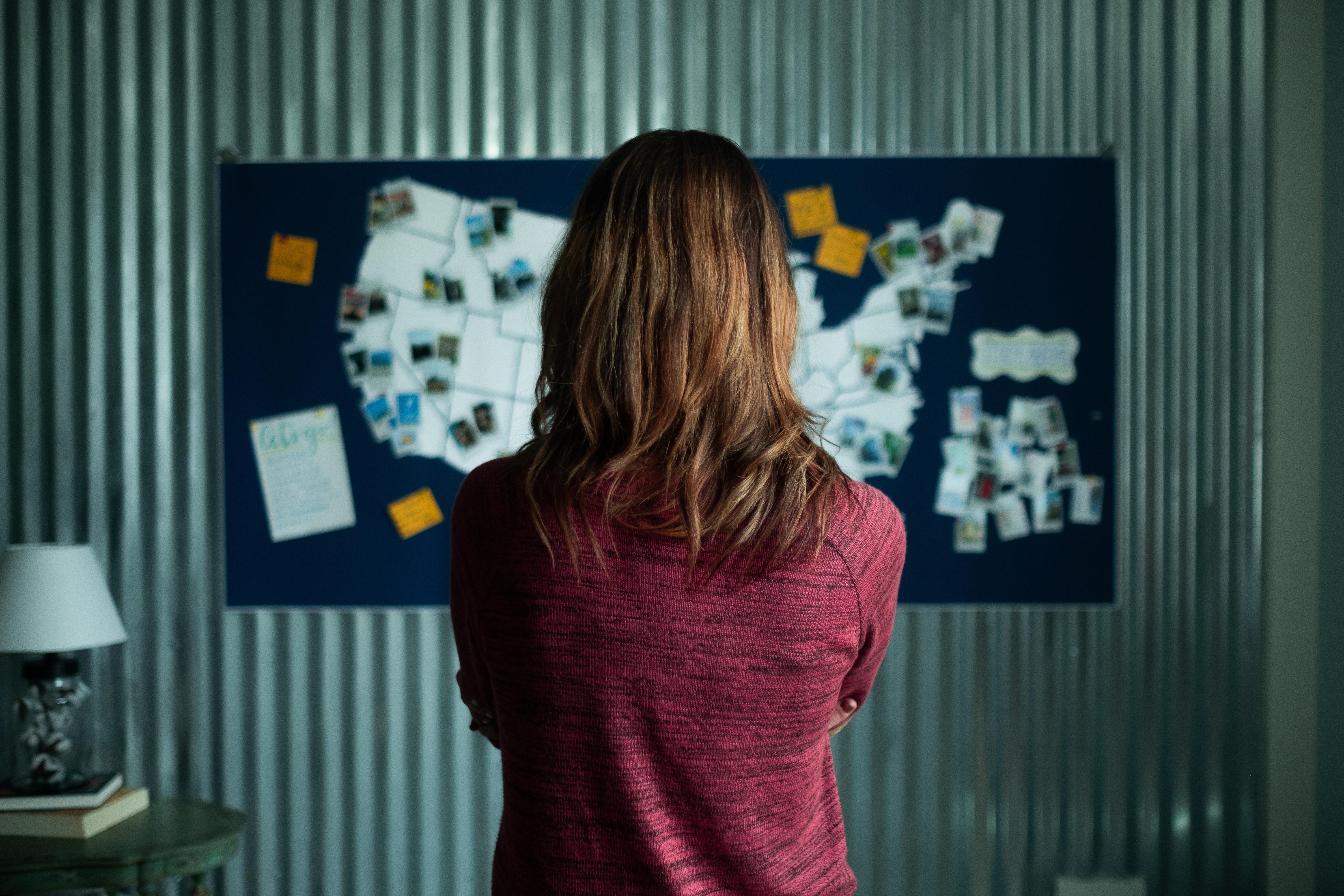 Woman looking at map