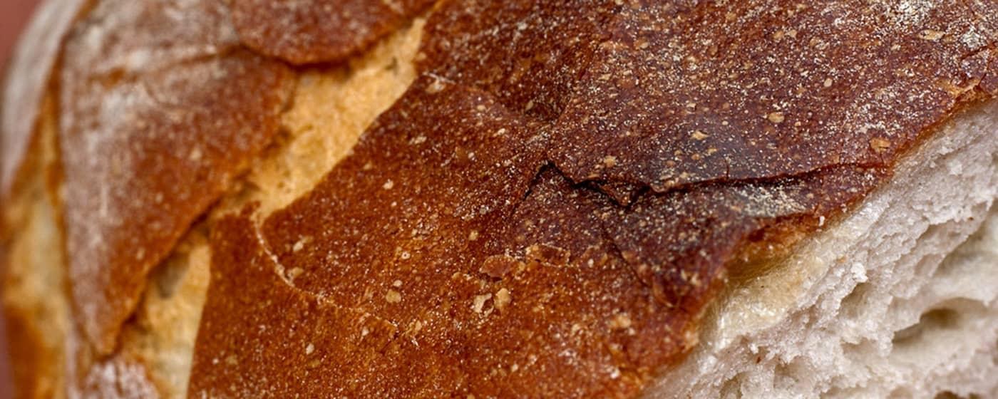 close up golden brown bread loaf