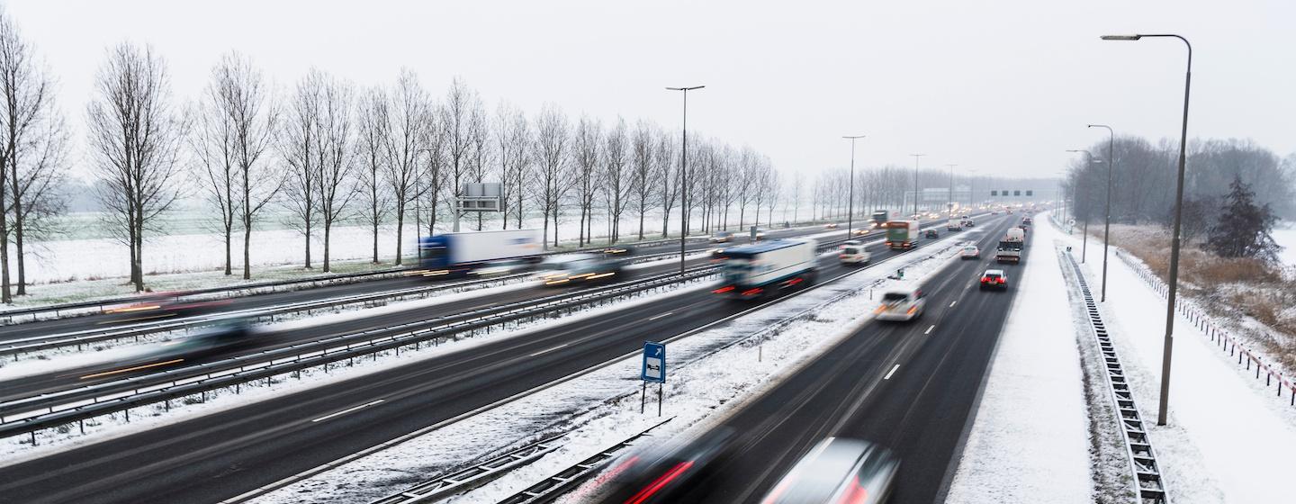 Snapshot of cars on highway during a winter day