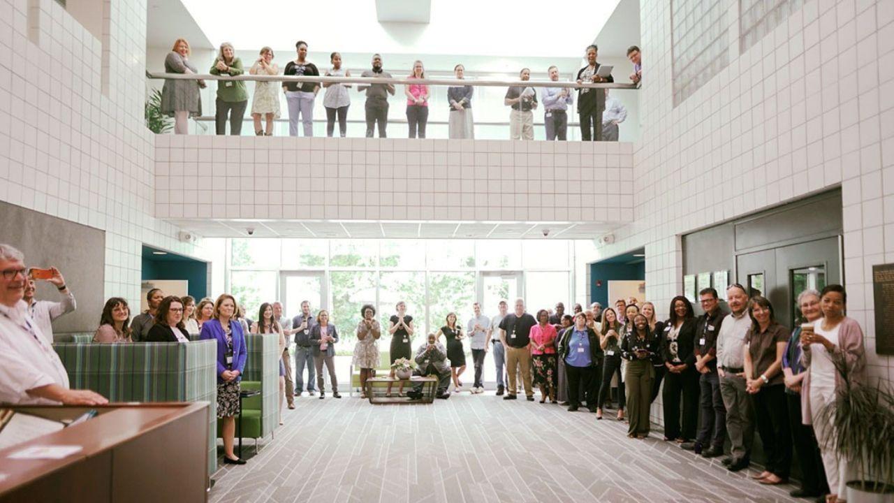 careers and employment, employees standing inside the building