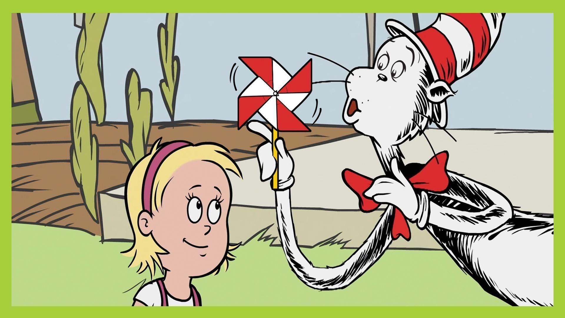 The Cat in the Hat blows into a pinwheel with Sally.