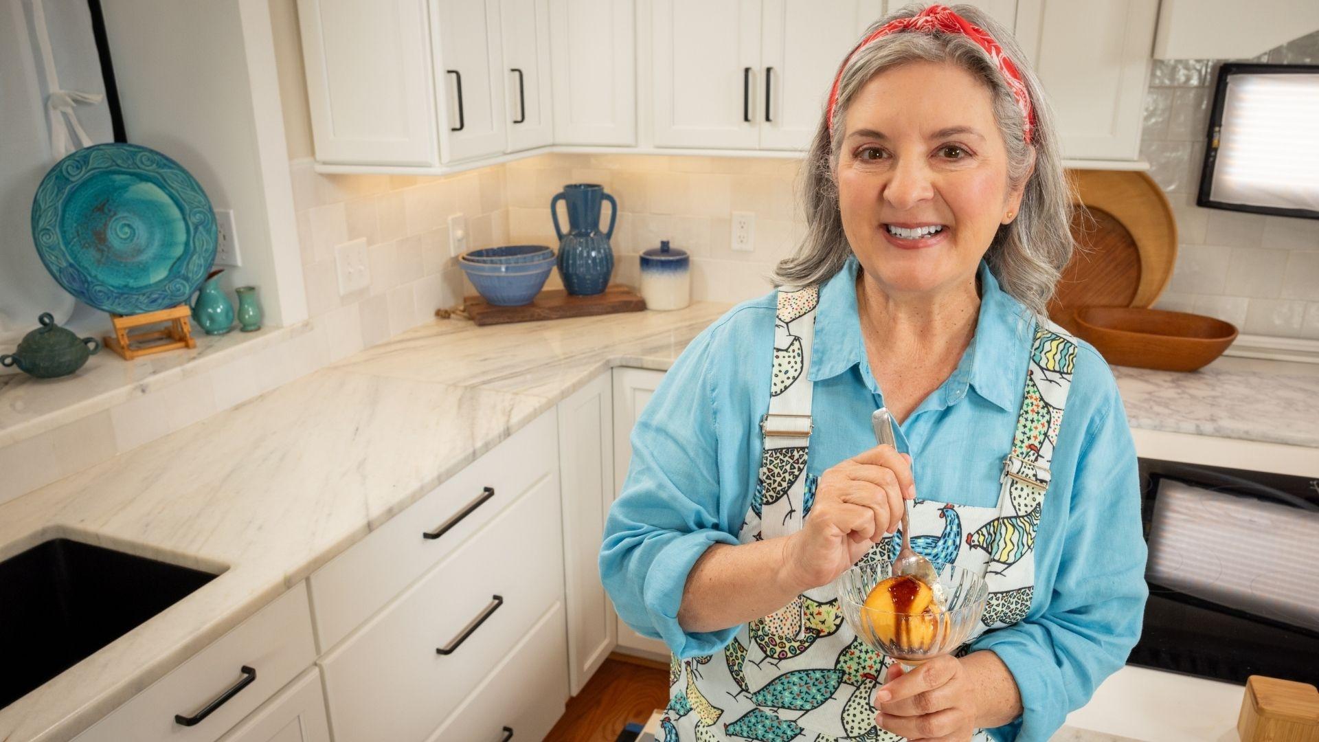 Sheri Castle holding a dish of peach sorbet.