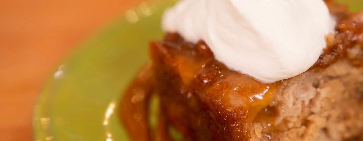 Piece of Apple Cake with Whipped Cream on top